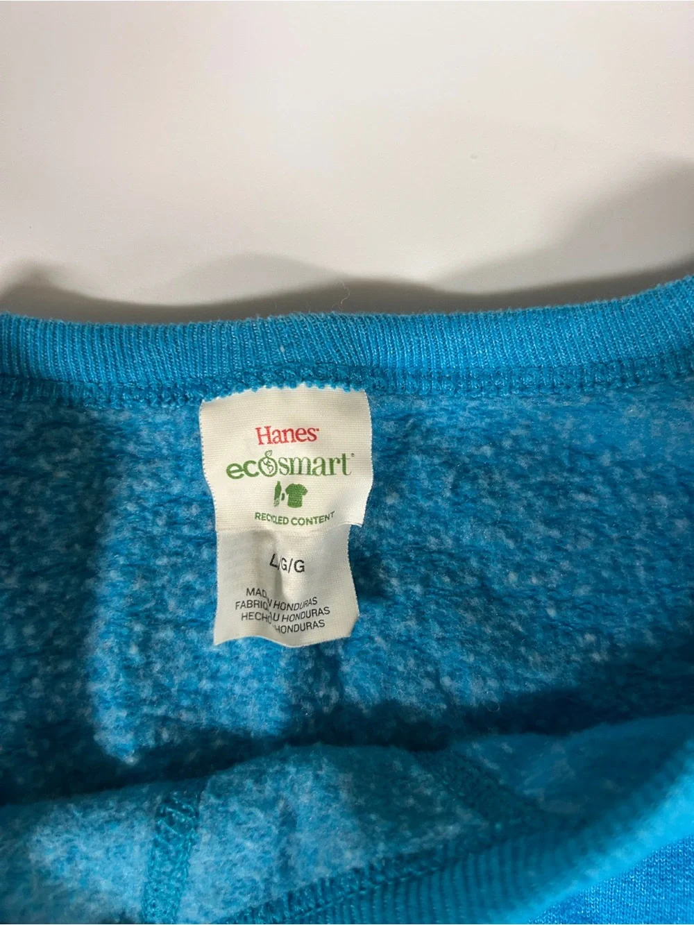 Two womens sweatshirts(blue and purple)